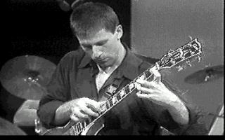Nick tapping guitar